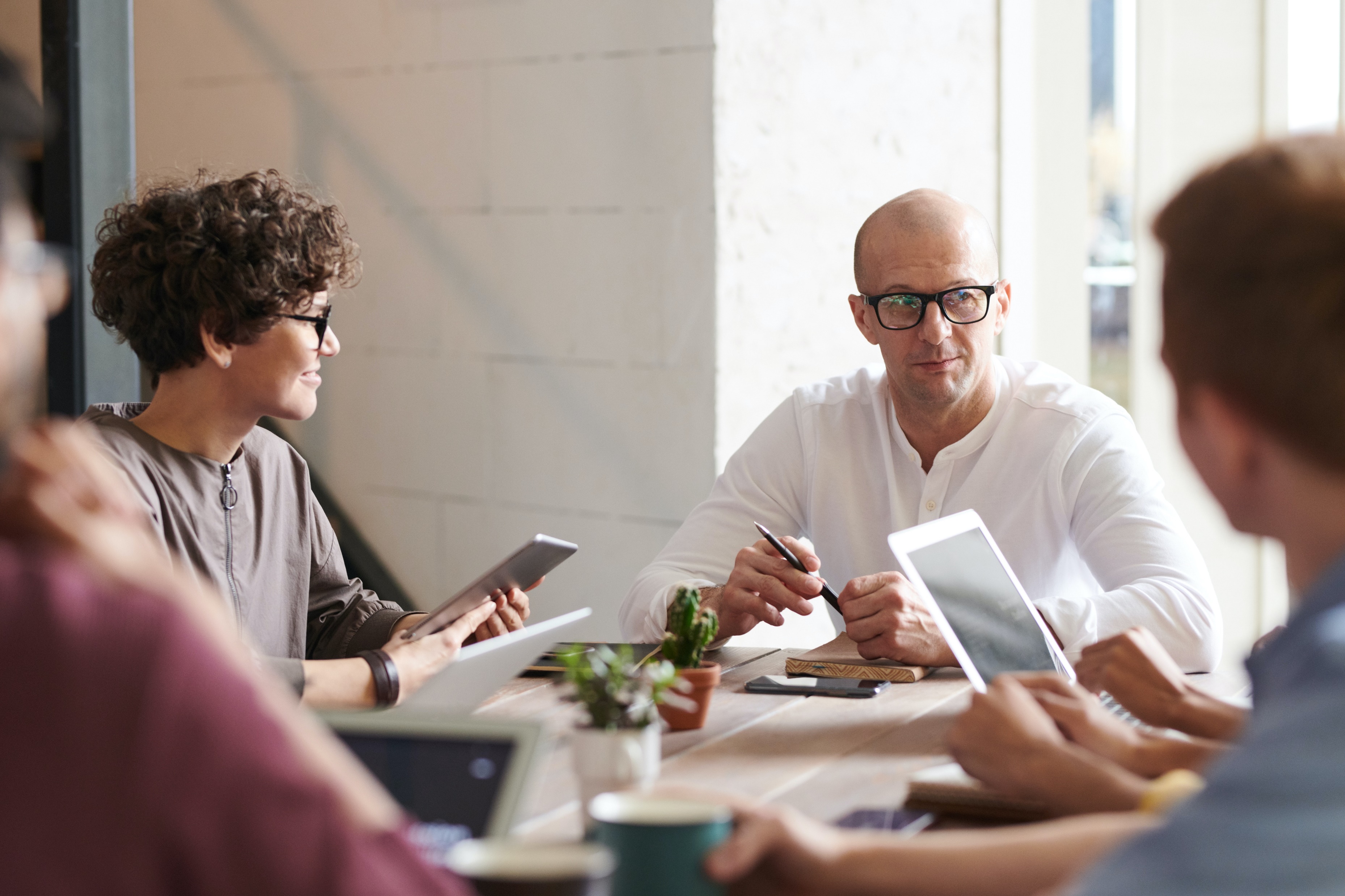 Professionals collaborating in a business meeting